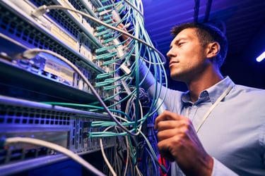 engineer-testing-cable-connections-on-network-serv-2026-03-10-03-09-50-utc