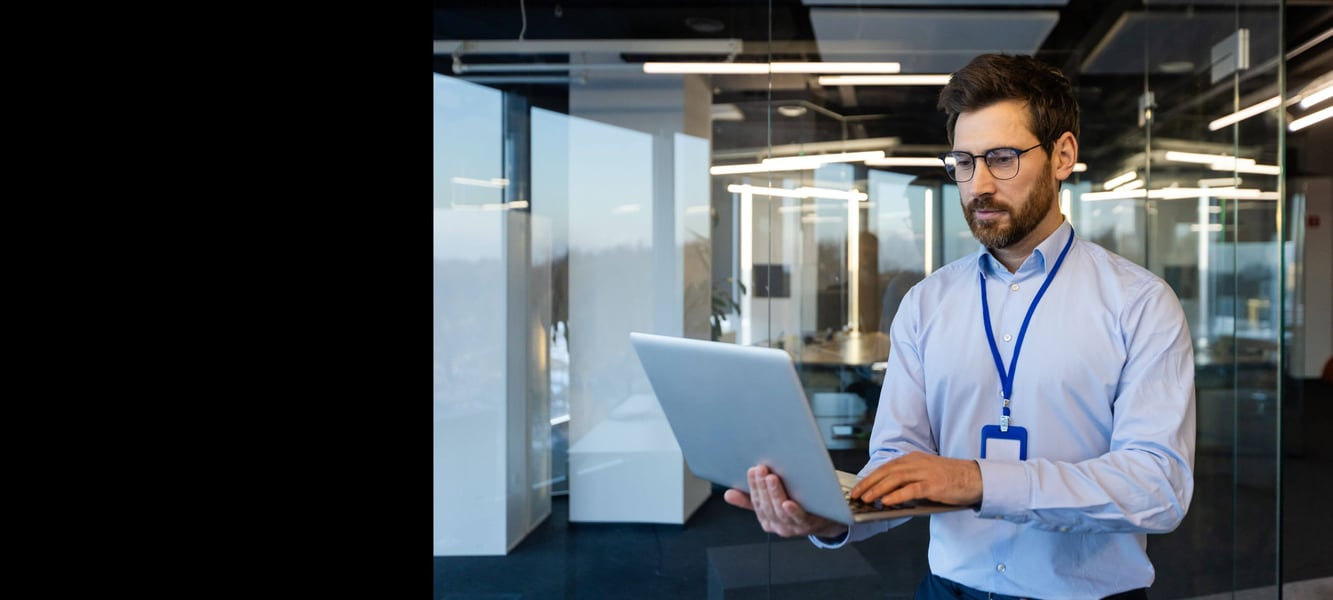man-holding-laptop