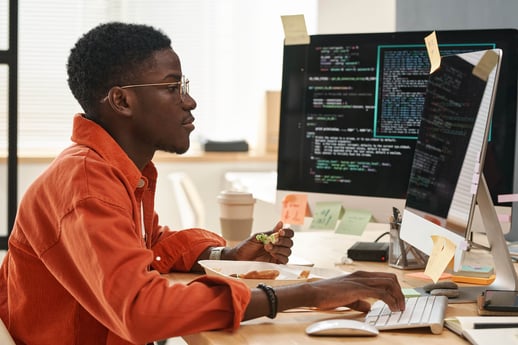 side-view-of-young-man-in-smart-casualwear-eating-2026-01-09-00-42-09-utc 1(1)